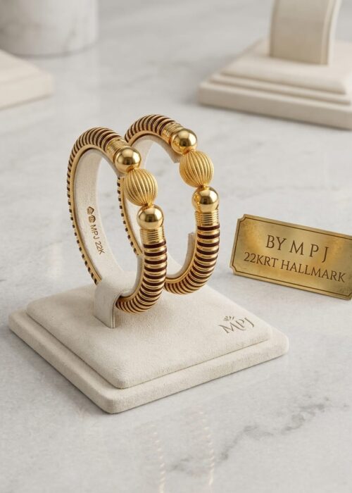 GOLD BANGLES