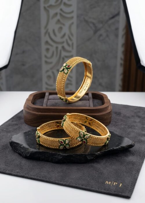 GOLD BANGLES