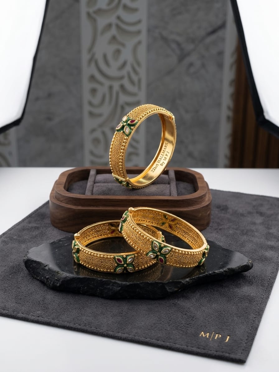 GOLD BANGLES