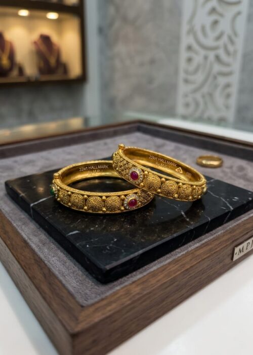 GOLD BANGLES